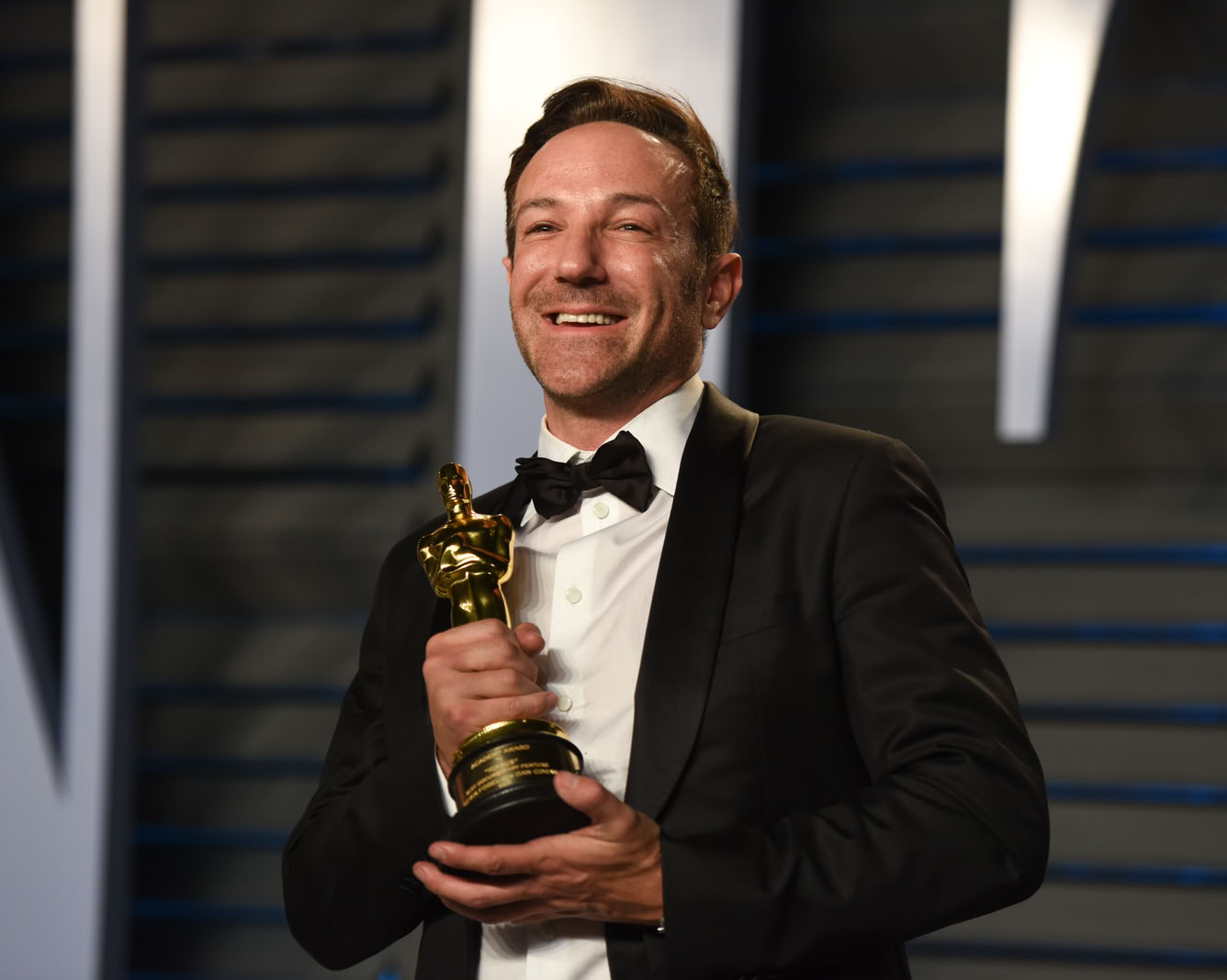 Bryan Fogel wins an Oscar®, the first for Netflix for their film ICARUS.